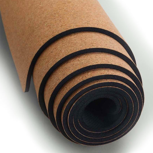 Thick professional cork yoga mat that sticks and provides ultimate grip